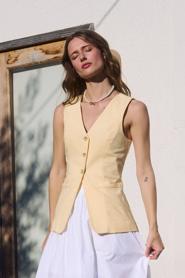 SLEEVELESS BUTTON DOWN BLOUSE