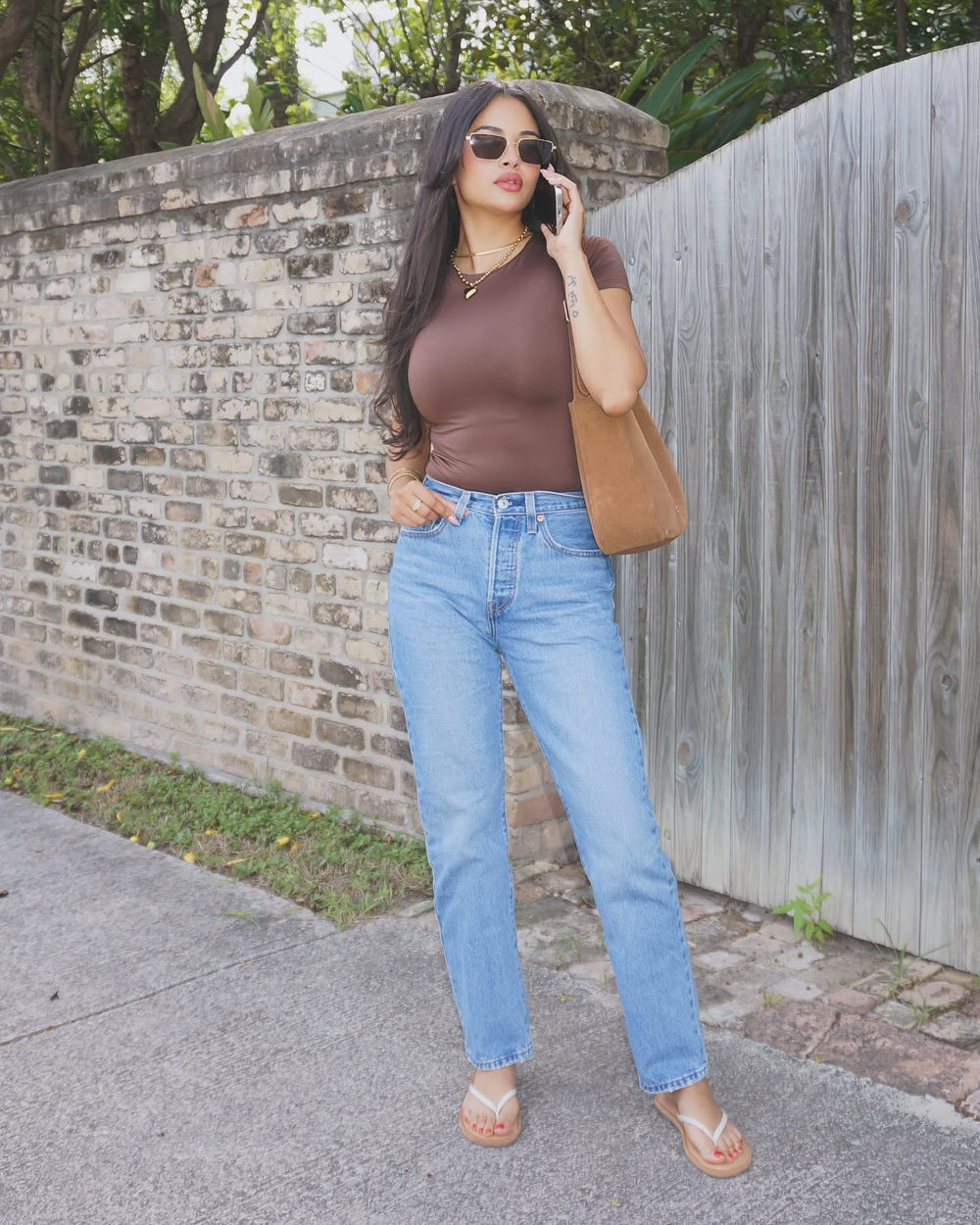 Brown body suit