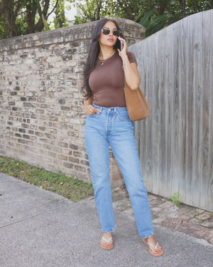 Brown body suit