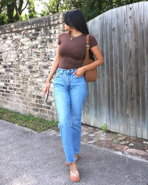 Brown body suit