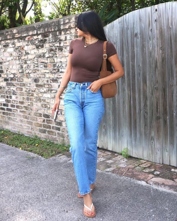 Brown body suit