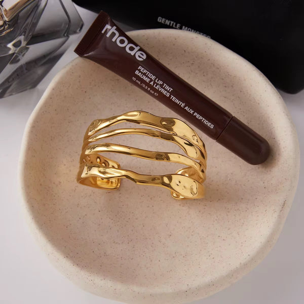 Gold cuff bangle